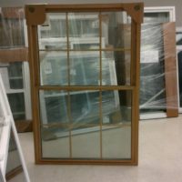 Double hung replacement window woodgrain oak screen low-e argon